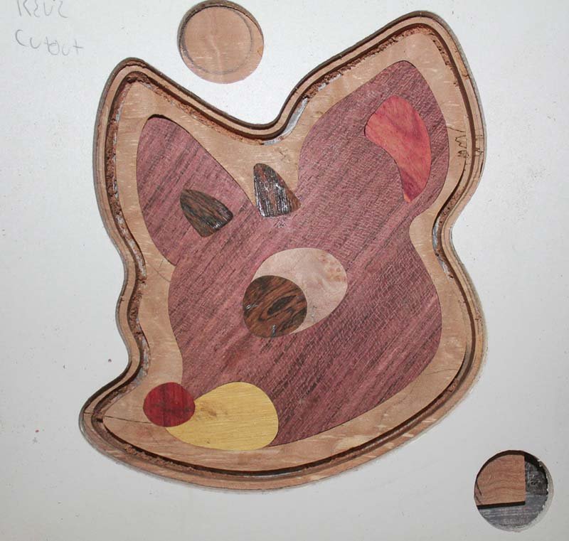 Layer 5, cut out the ornament as an inlay